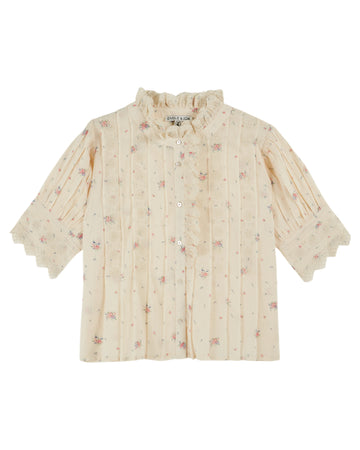 frill stand neck short sleeve pleated button down cream blouse with small floral print throughout from emile and ida