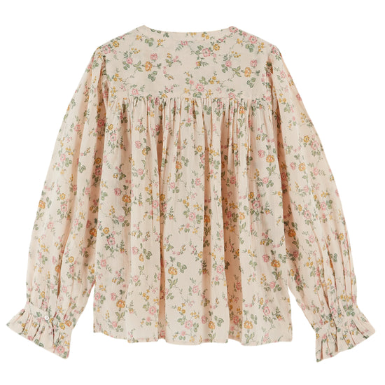 round neck blush pink button down blouse with delicate flower print, pleat detailing and pleated cuffs from emile and ida rear