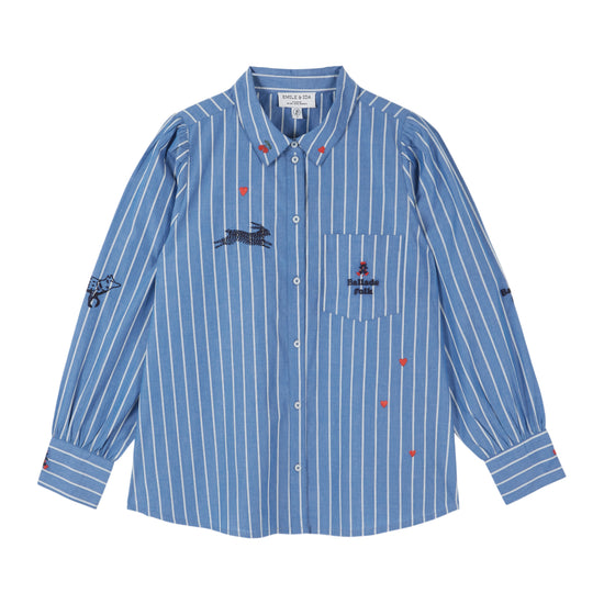 white and blue striped shirt with embroidery on a white background