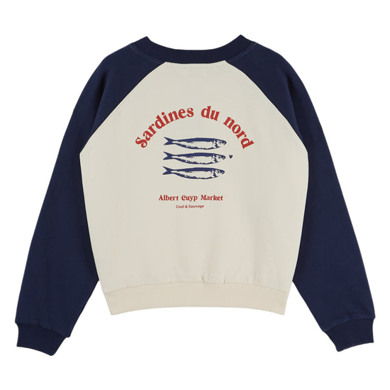 blue and white sweatshirt with fish detail on white background