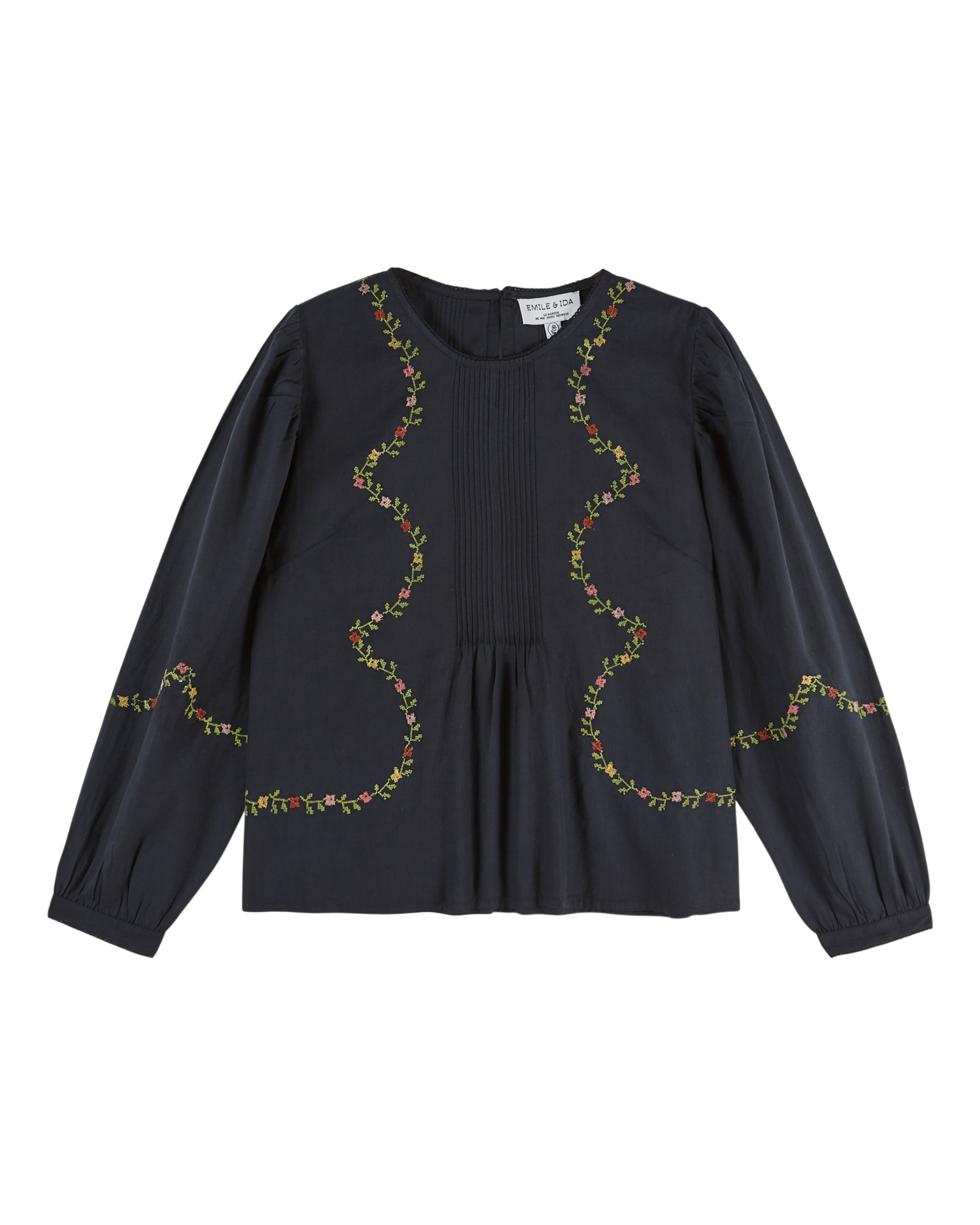 black blouse with flower embroidery on white background