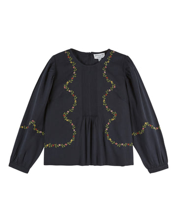 black blouse with flower embroidery on white background