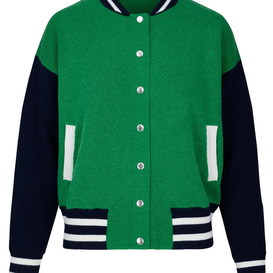 Knitted green bomber jacket with navy sleeves and white details with silver popper closures