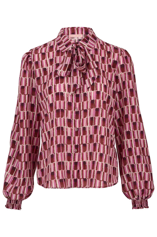 pink geometric silk blouse with half button placket and removable tie from tabitha webb