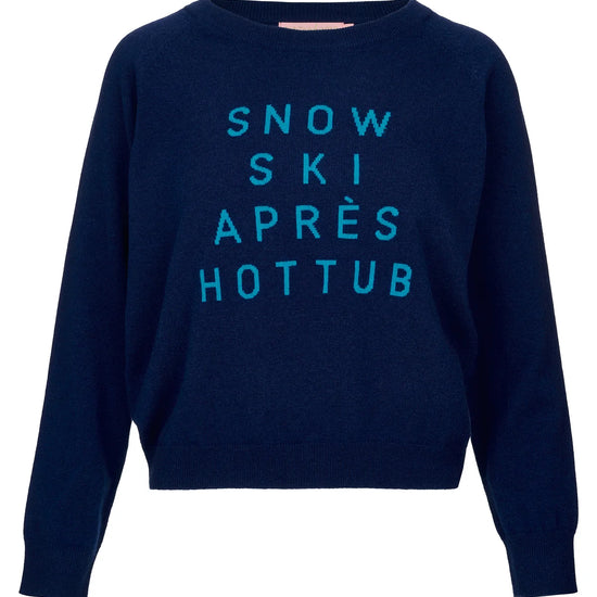 navy round neck jumper with light blue snow ski apres hot tub slogan on the front