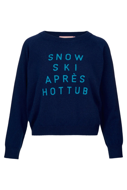 navy round neck jumper with light blue snow ski apres hot tub slogan on the front