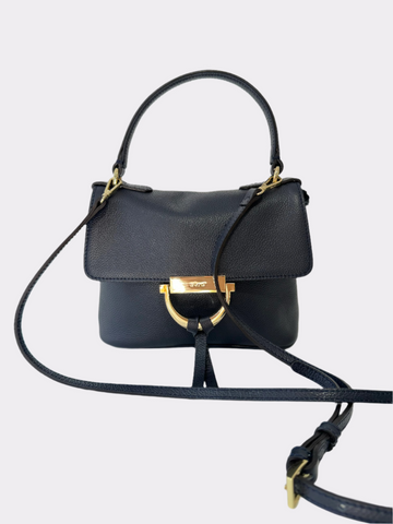 Small navy handbag with gold touches with a longer and short strap.