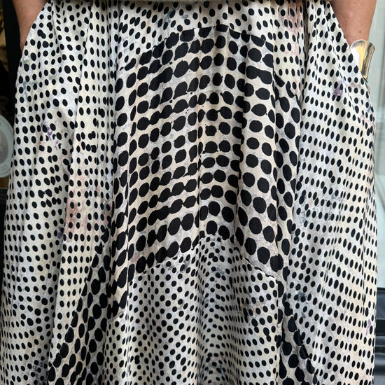 Black and white spotted design skirt.