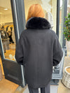 Navy coat with faux fur collar.