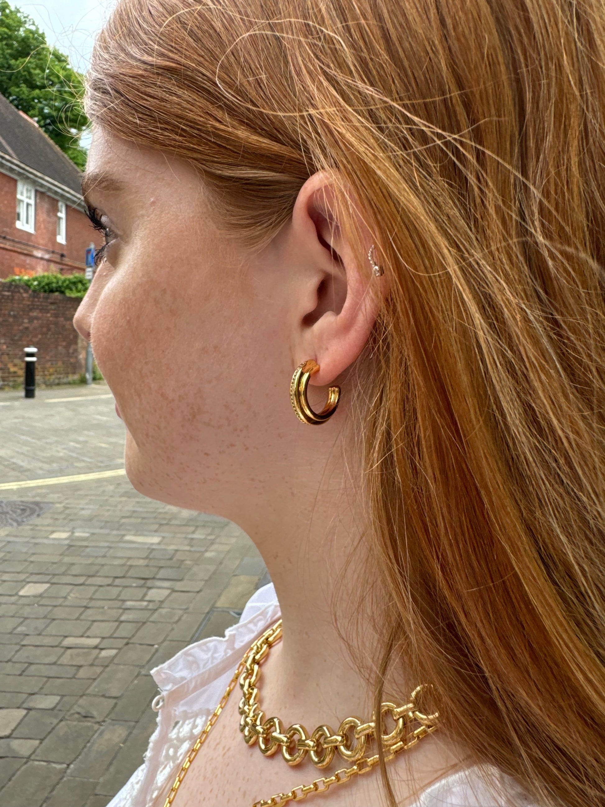 gold hoops with cubic zirconia stones