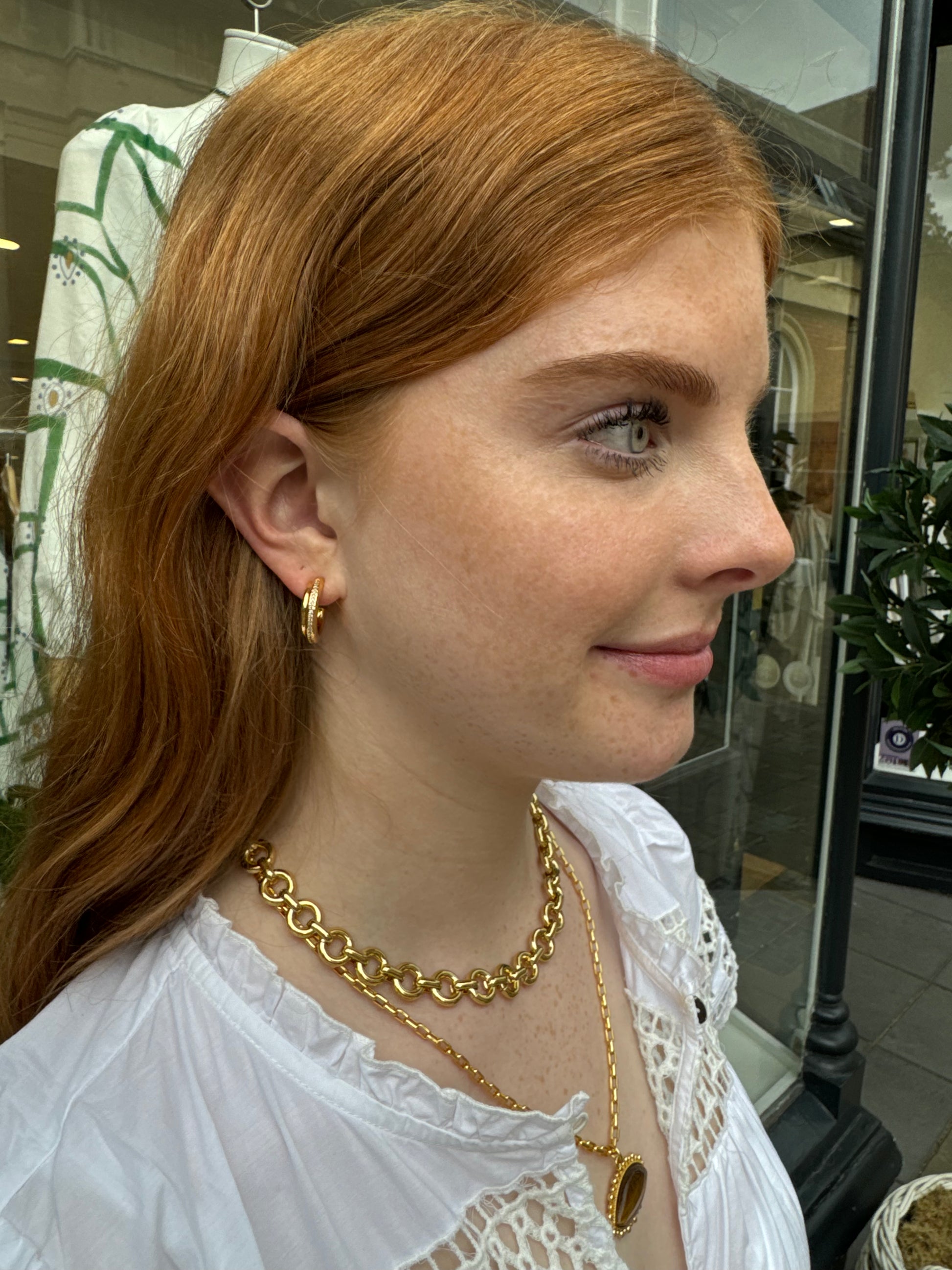 gold hoops with cubic zirconia stones