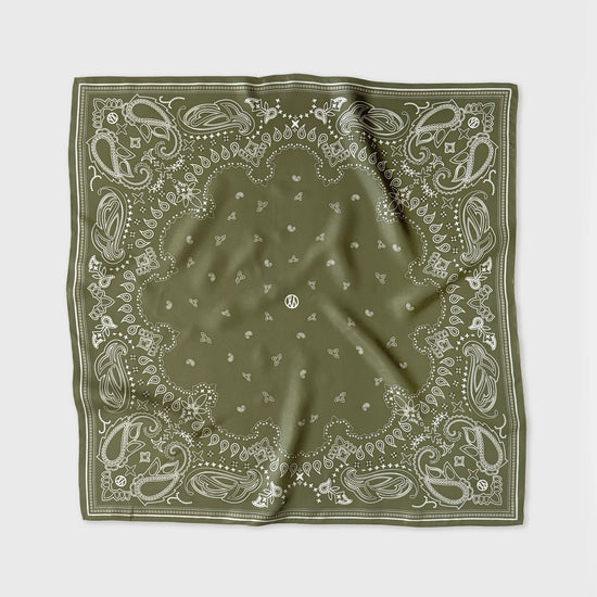 Green bandana with white patterns on a white background