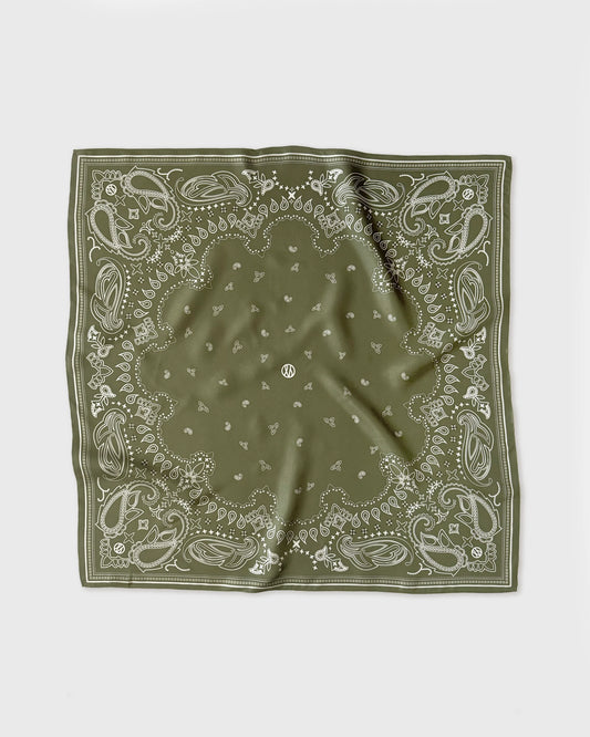 Green bandana with white patterns on a white background