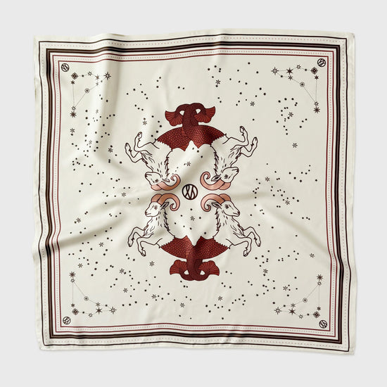Decorative scarf with reindeer design on a white background