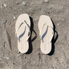 Square toe beige rubber flip flops from sleepers 