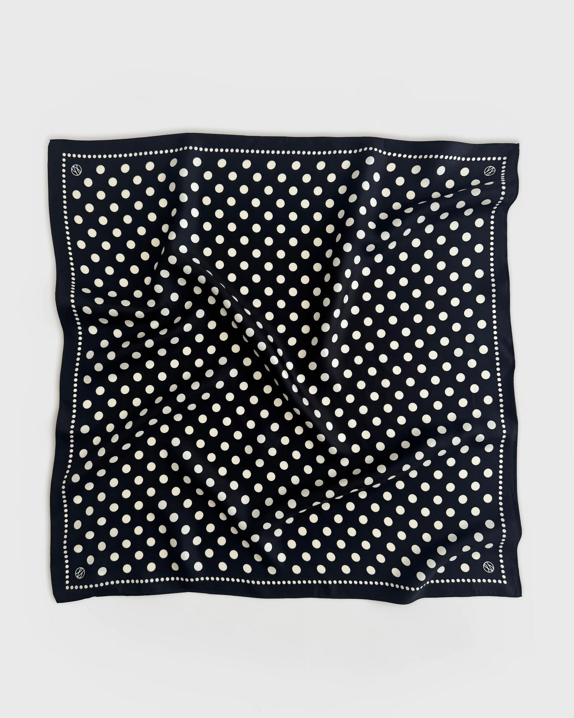 black silk square scarf with black background and white polka dots from lescarf