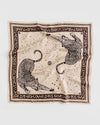 Decorative scarf with leopard design on a beige background