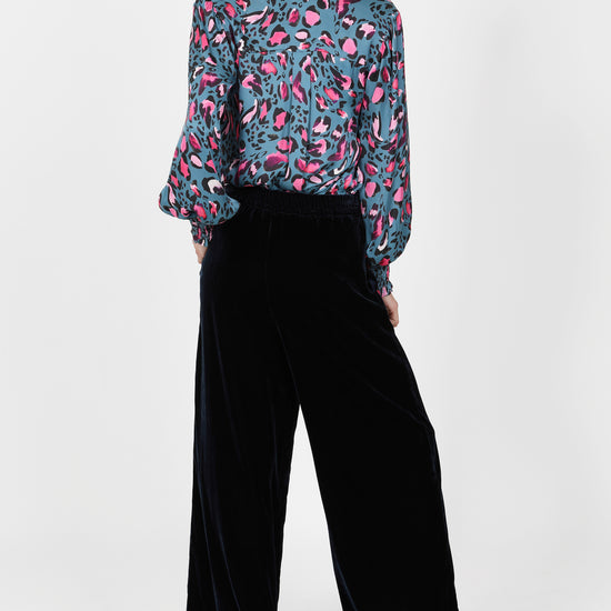 navy velvet wide leg trousers with elasticated rear waist  rear view 