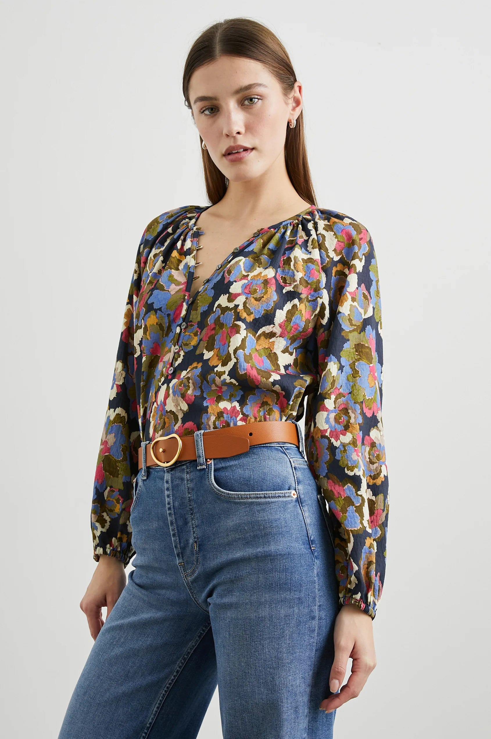 Floral print top with a half button placket and long sleeves closer shot