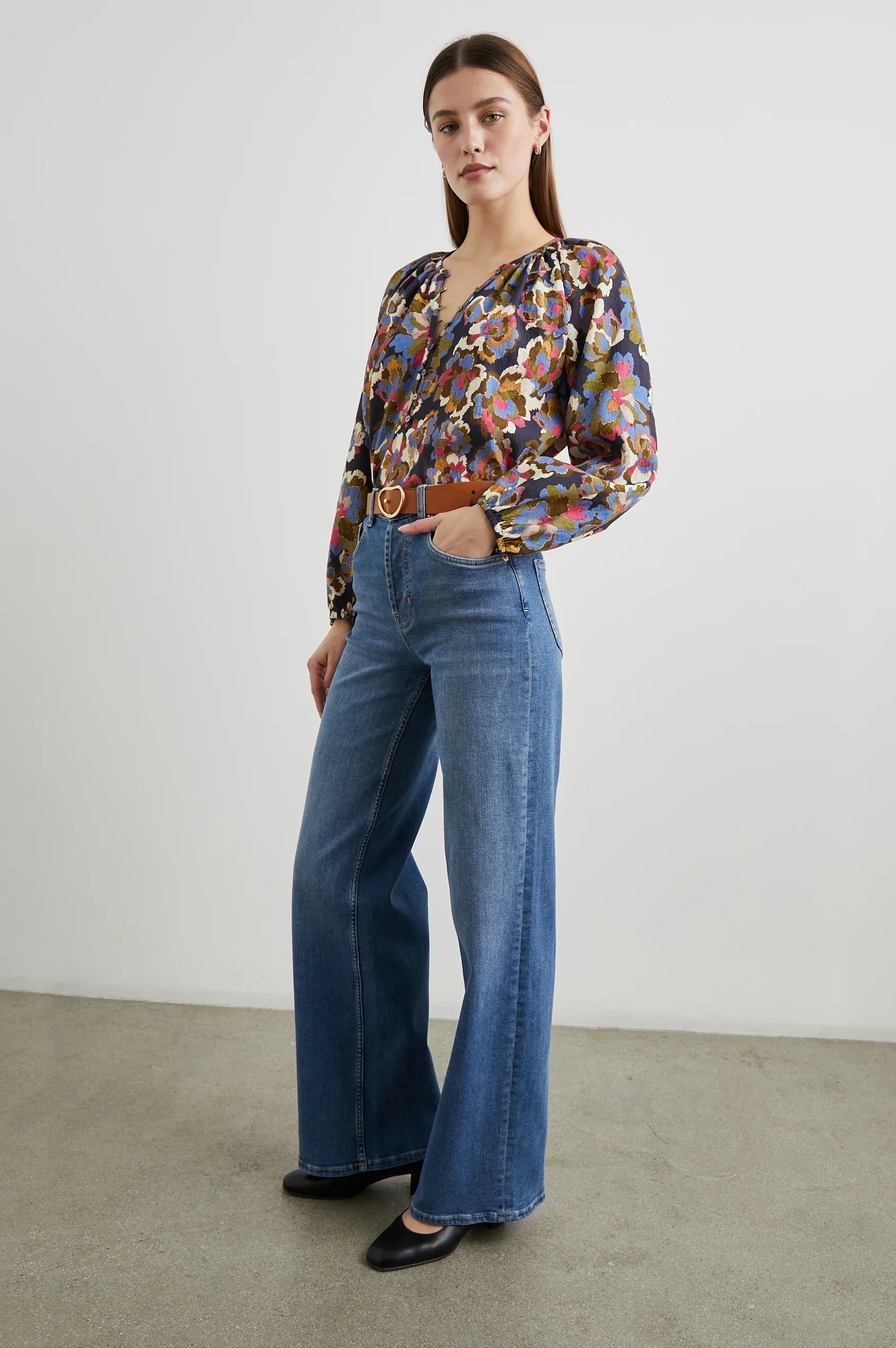 Floral print top with a half button placket and long sleeves model shot