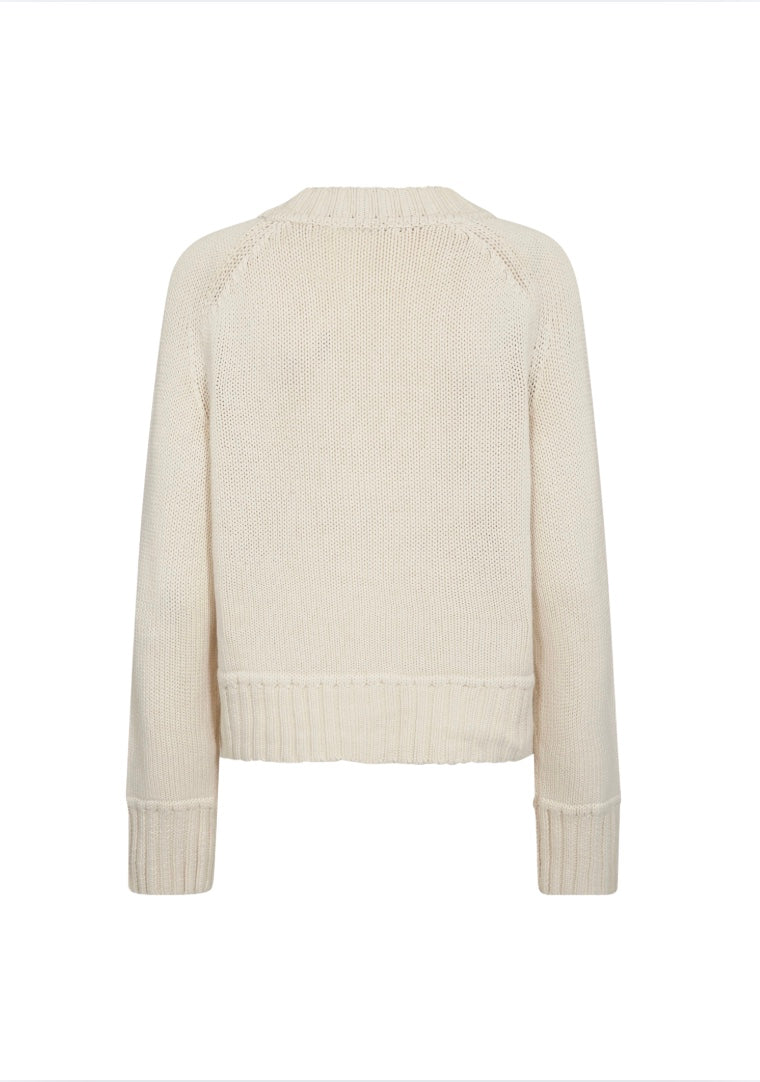 Beige sweater on a white background