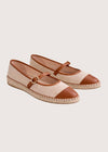 Beige flat shoe with tan cap-toe and woven sole 