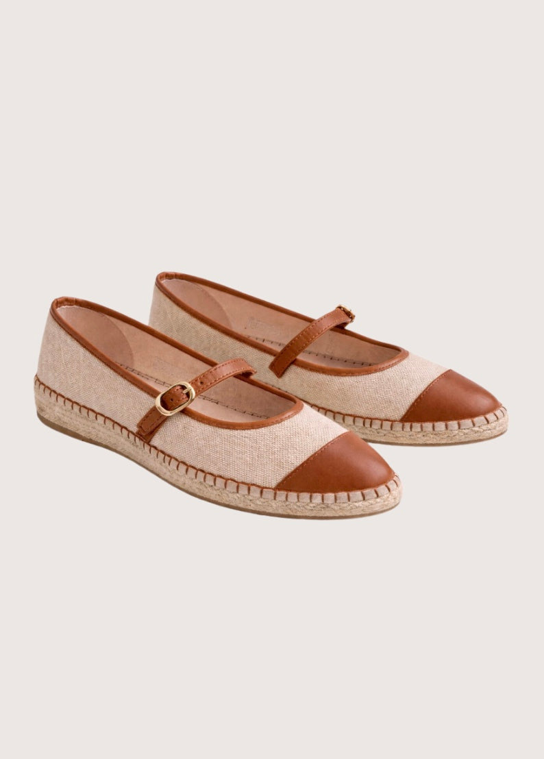Beige flat shoe with tan cap-toe and woven sole 