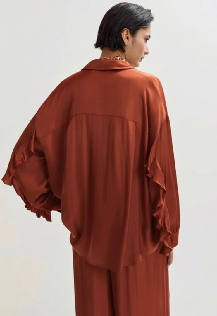 copper satin shirt on a white background