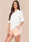 White shirt with classic colalr and covered placket with turn up cuffs and two front chest pockets