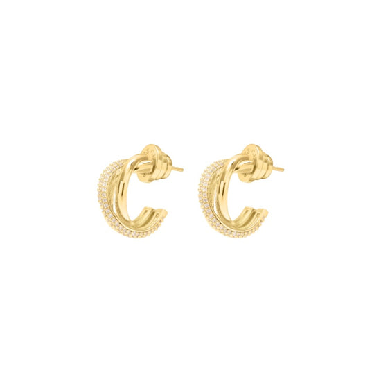 A pair of gold huggie hoop earrings with cz stones and a cross over style 