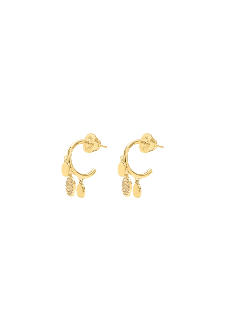 A pair of gold dangle earrings with a textured disc, a solid gold disc, and a small gold disc at the bottom.