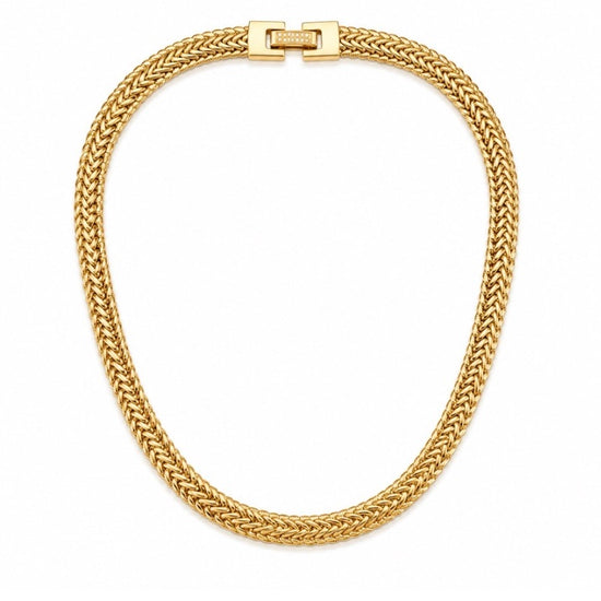 A gold braided chain necklace with a rectangular clasp