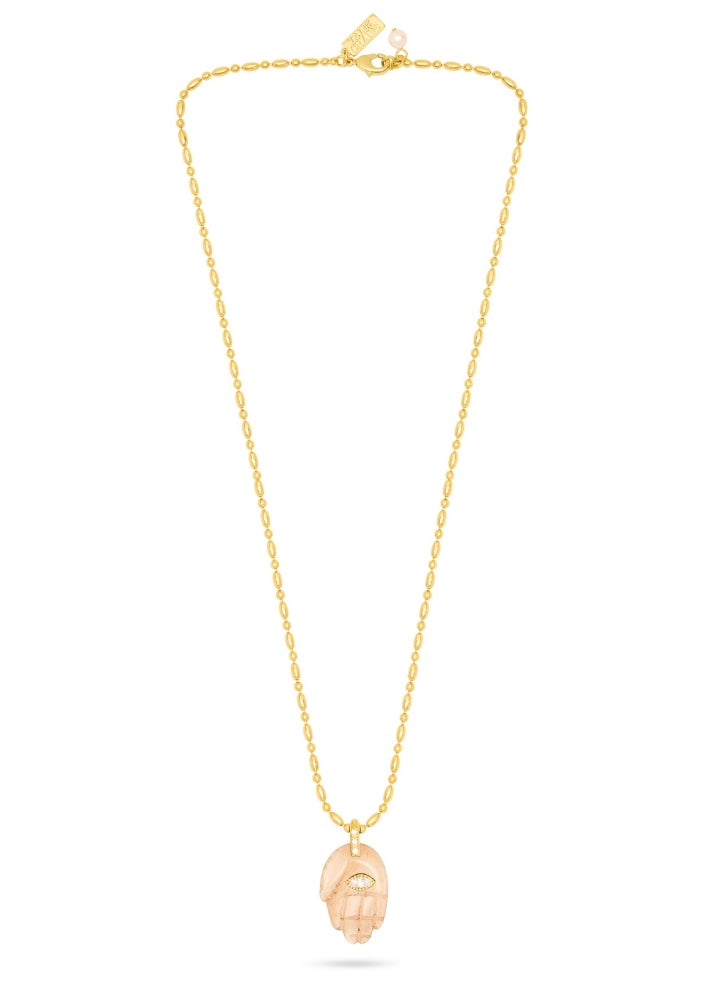 textured gold chain with protective hand pendent in a smokey quartz colour