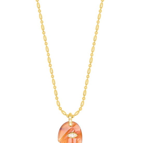 textured gold chain with protective hand pendent in a red quartz colour