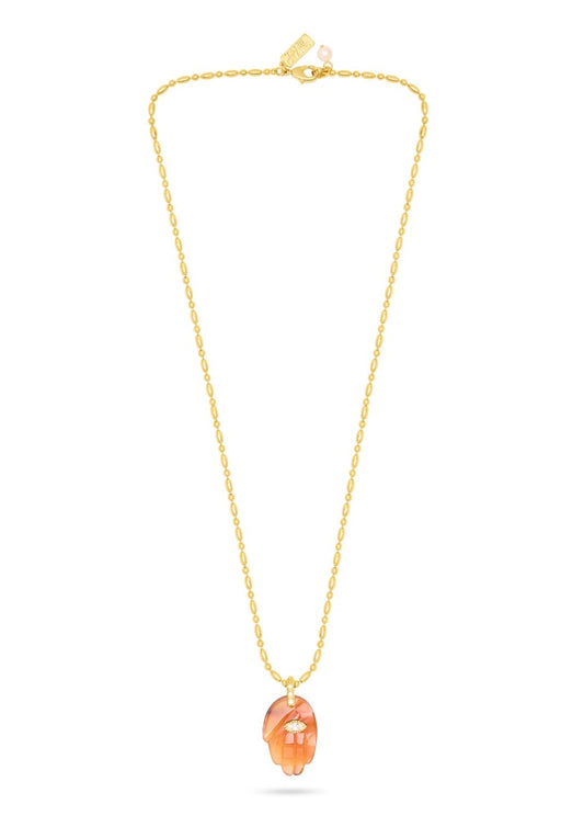 textured gold chain with protective hand pendent in a red quartz colour