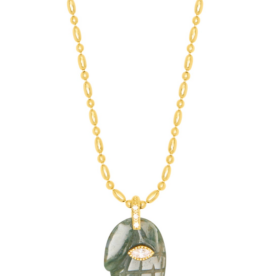 textured gold chain with protective hand pendent in a indian green