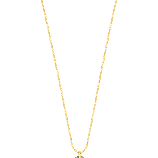 textured gold chain with protective hand pendent in a indian green