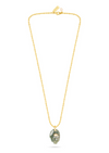 textured gold chain with protective hand pendent in a indian green