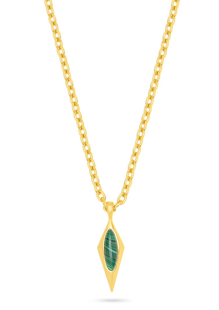 A gold chain necklace with a diamond-shaped pendant featuring a green stone.