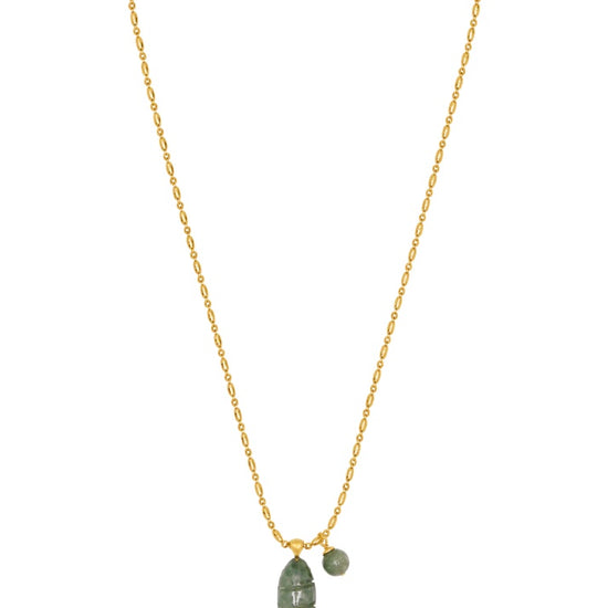 chunky gold chain with a green fish pendant