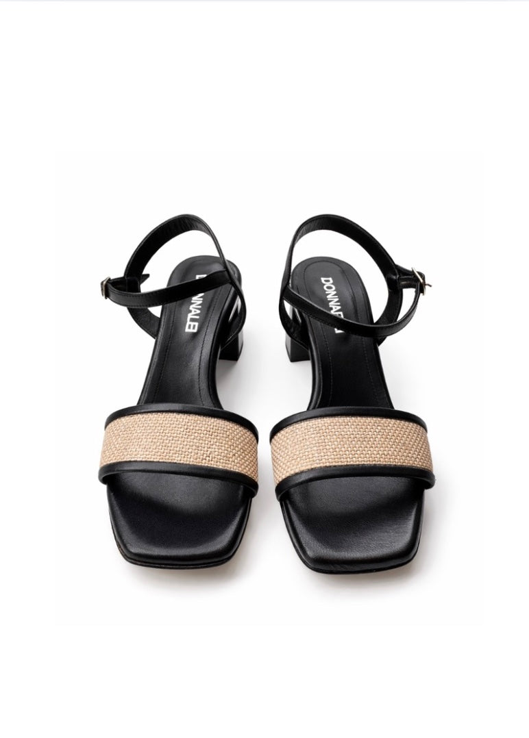black heeled sandal with raffia detail across toe