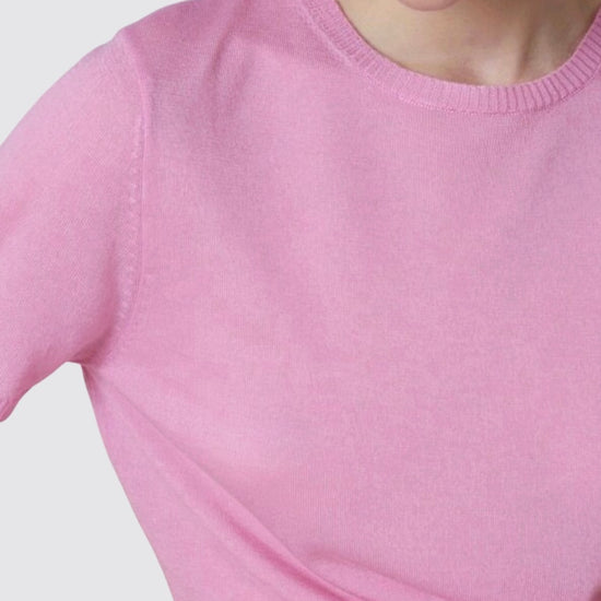 close up of neckline on short sleeve lyocell cashmere blend knit in hot pink