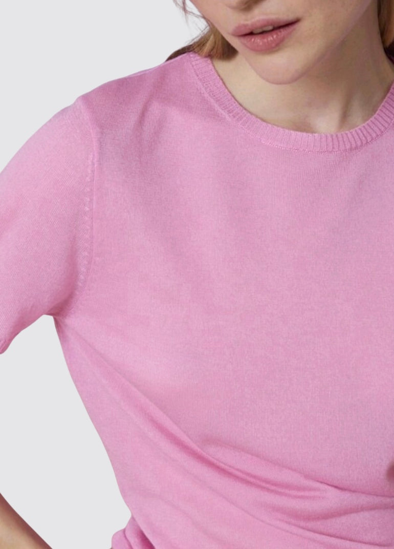 close up of neckline on short sleeve lyocell cashmere blend knit in hot pink