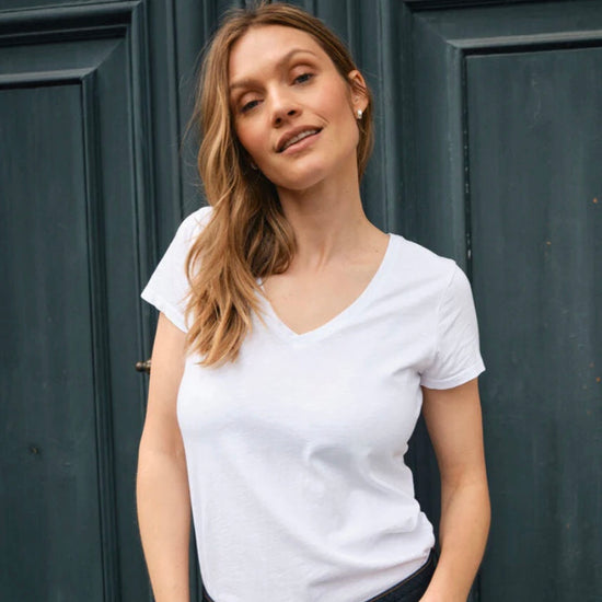 model wearing v- neck cotton white t-shirt