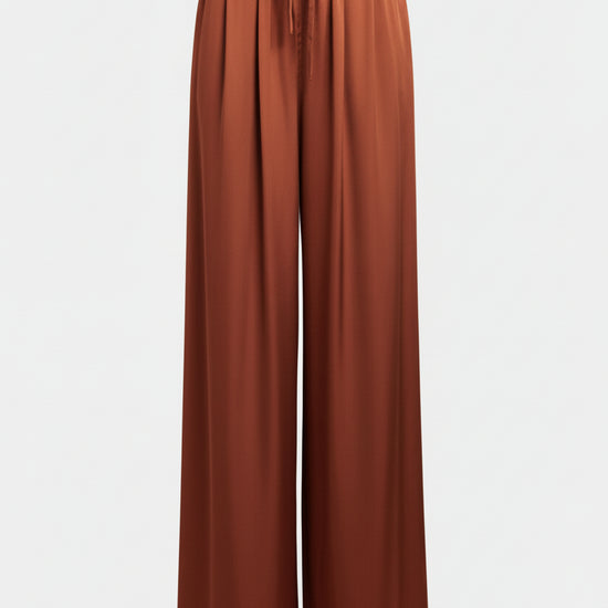 Brown wide-leg pants on a light gray background