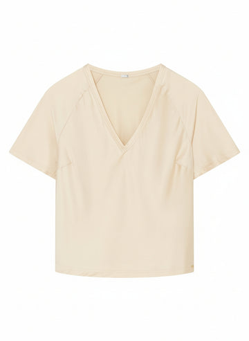 cream silk blouse with a V-neck 