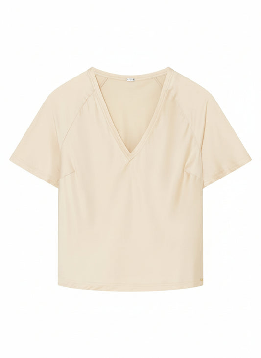 cream silk blouse with a V-neck 