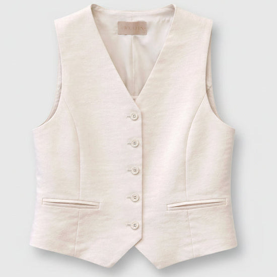 Beige vest on a white background