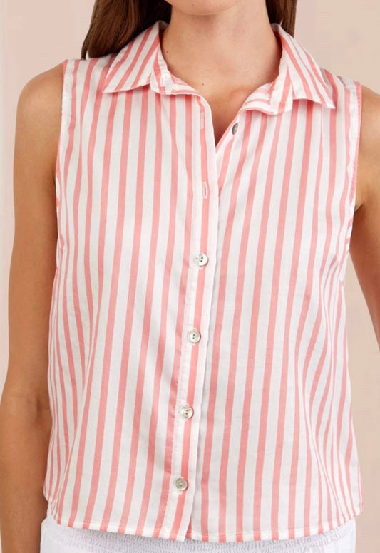 Woman wearing a sleeveless pink and white striped shirt against a beige background