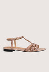 Beige sandal with strap design on a beige background